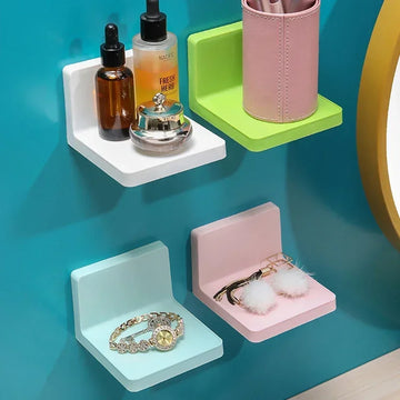 Small coloured wall shelves holding jewellery and cosmetic accessories in a catalogue arrangement